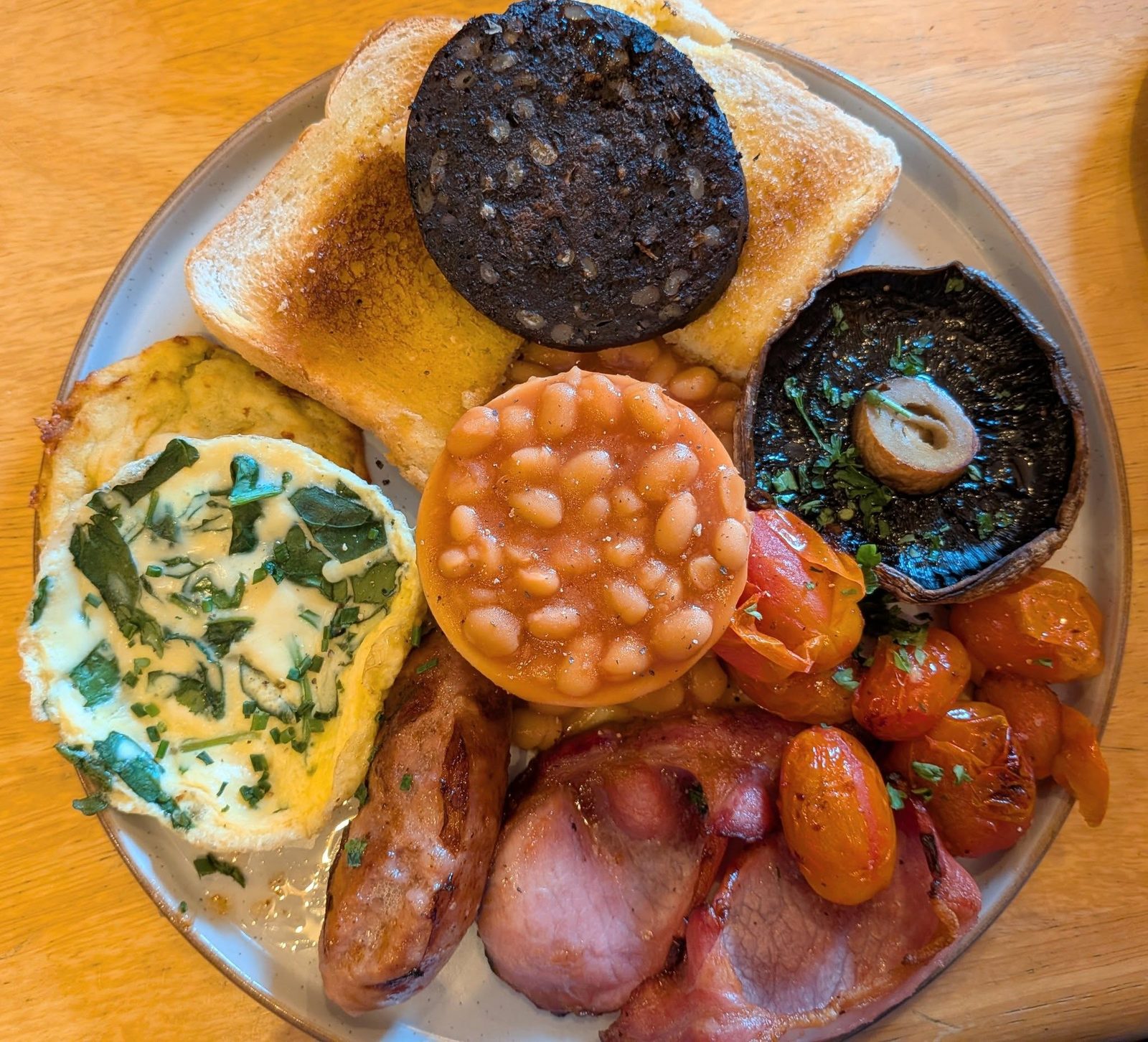Full Cornish Breakfast Bodmin with bacon sausage egg beans mushrooms tomatoes toast and hogs pudding